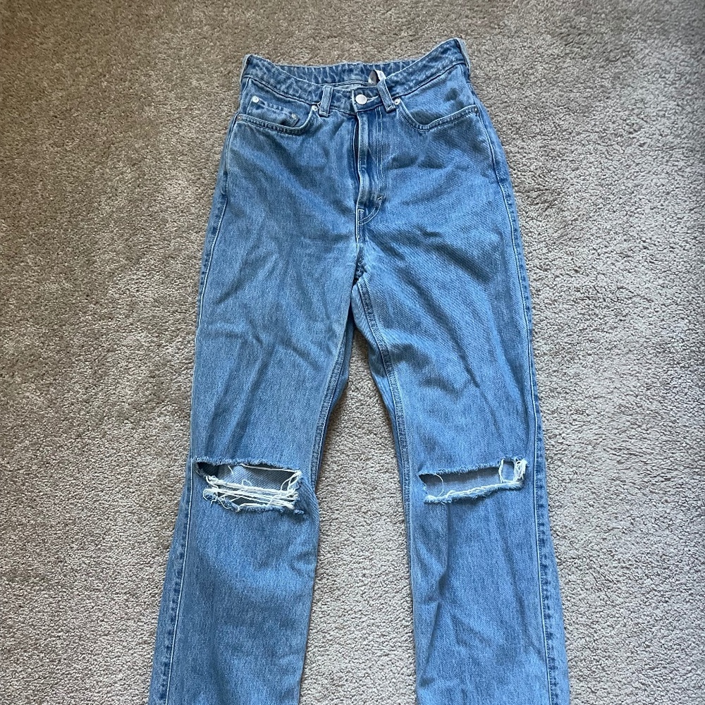 ripped straight leg jeans